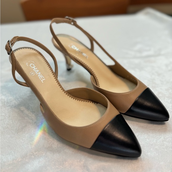 CHANEL Shoes - Chanel Classic Slingback Pumps - Size 37 - Tan/Black - Silver and Pearl Accents.